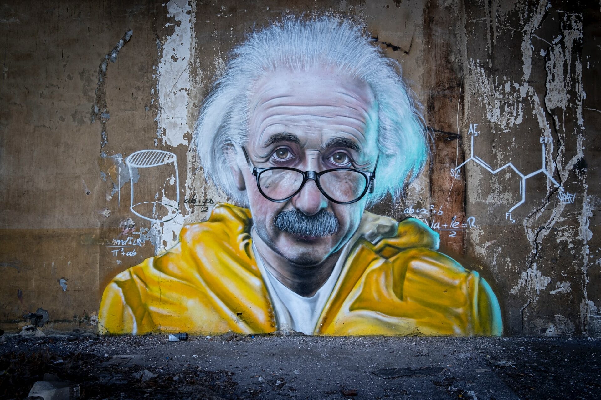 albert einstein painted on a wall mural on street