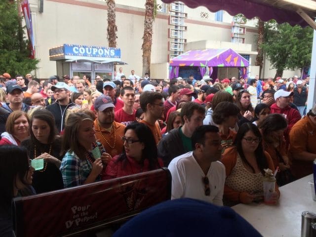 a large crowd of people sitting outside
