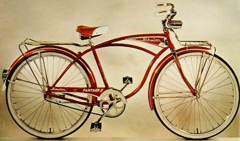 a red bicycle with a white background