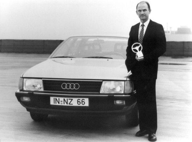 Ferdinand Piech standing next to a car