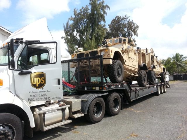 a military vehicle on a trailer