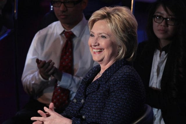 Hillary Clinton in a suit and tie
