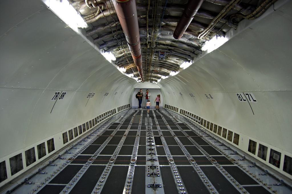 people standing on a train platform