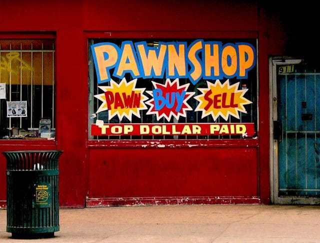 a red building with a sign on it