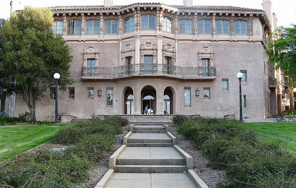 a building with a staircase and a walkway