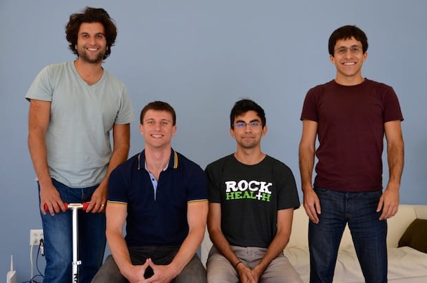 a group of men posing for a photo