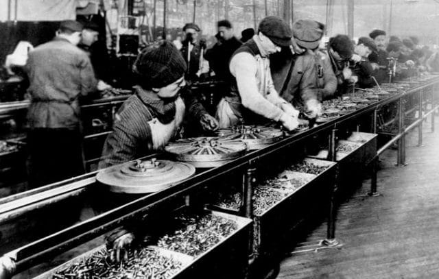 a group of people working in a factory