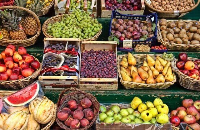 a group of baskets full of fruits