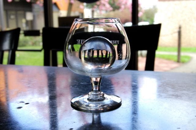 a glass of water on a table