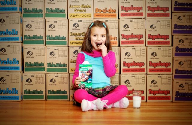 a girl sitting on the floor