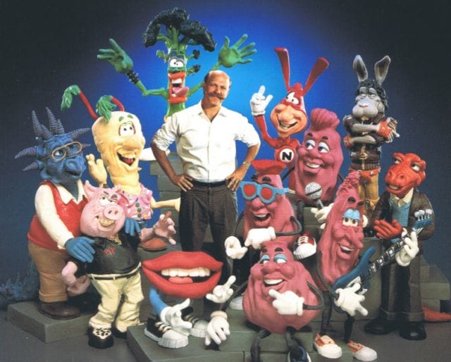 a person standing next to a group of cartoon characters