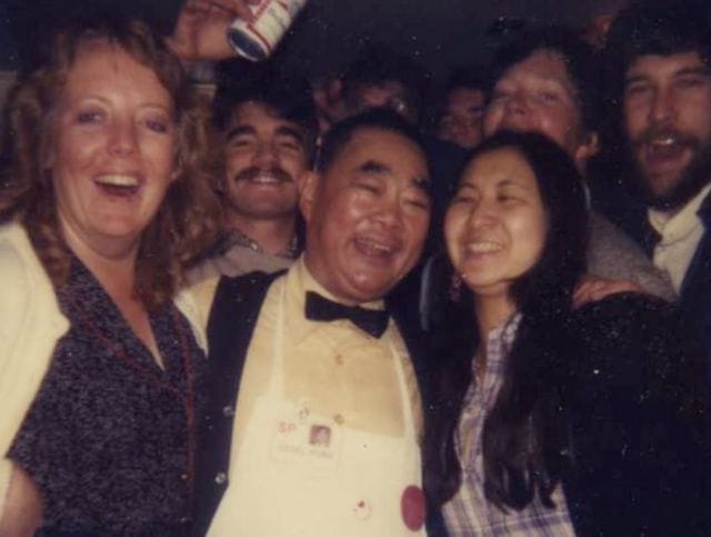 a group of people posing for a photo