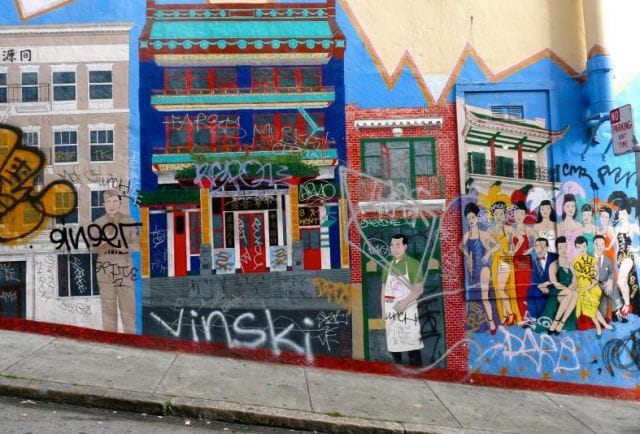 a colorful building with graffiti