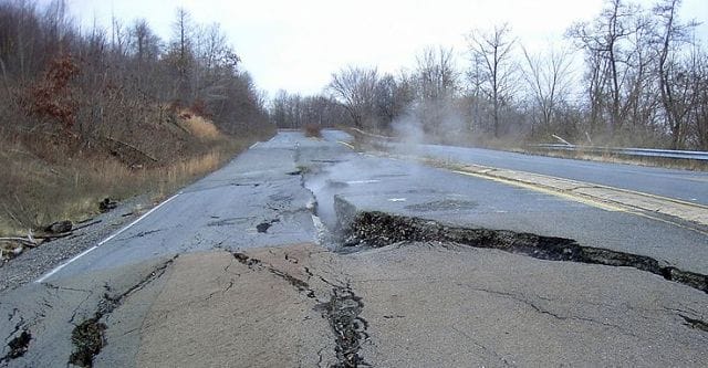 a road with snow on the side