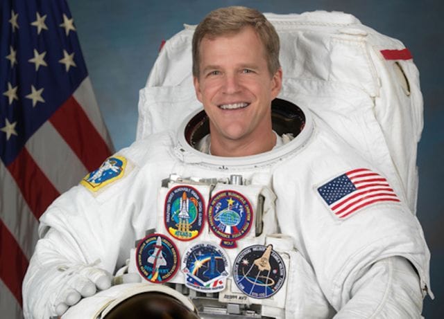Scott E. Parazynski in a space suit