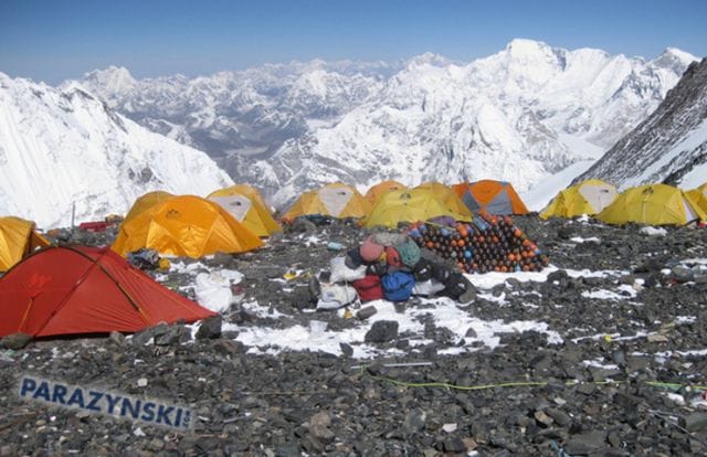 a group of tents in a snowy place