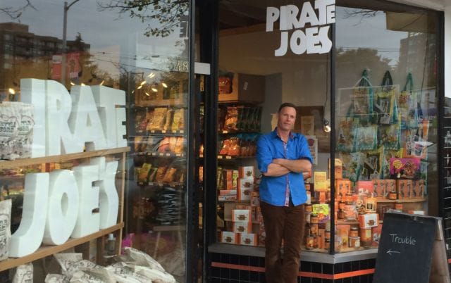 a person standing in front of a store window