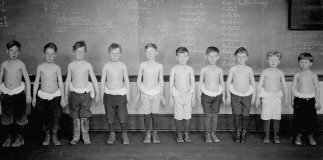 a group of boys posing for a photo