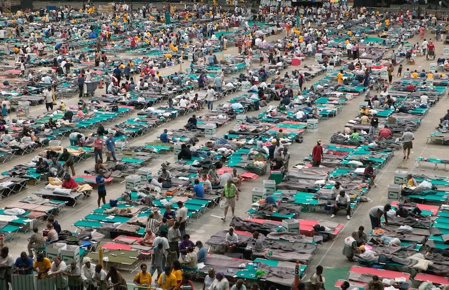 a large crowd of people at a beach