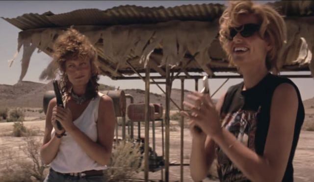 a couple of women stand near each other