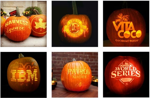 a group of pumpkins with faces carved into them