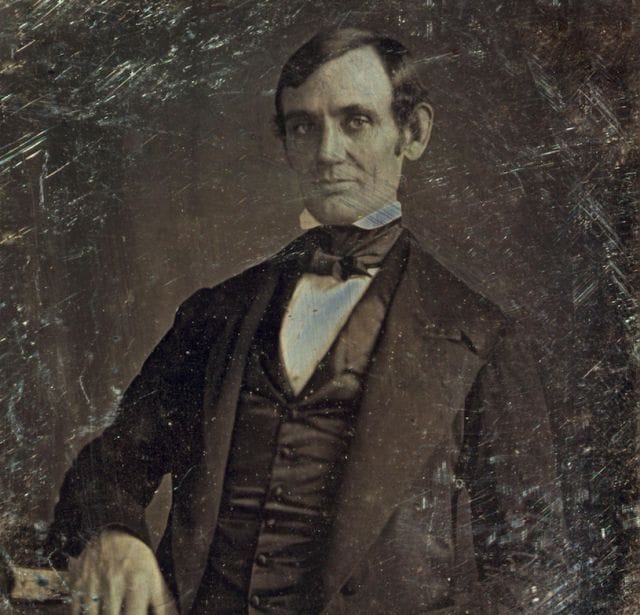 Phillip S. Paludan in a suit