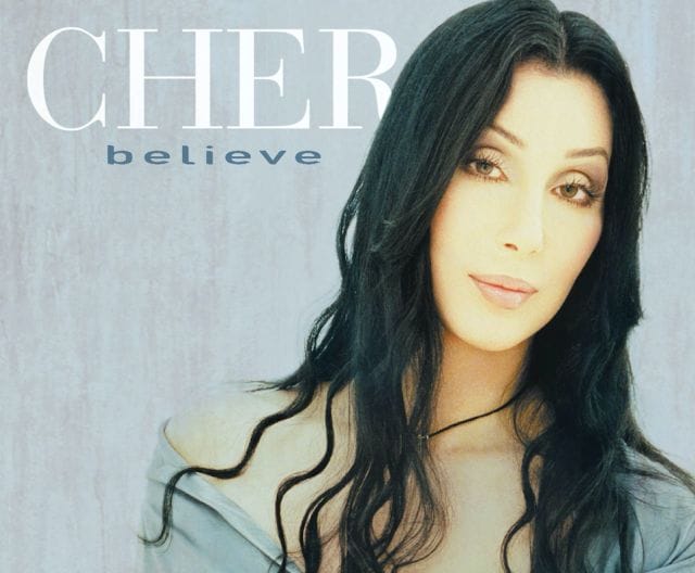 Cher with long black hair