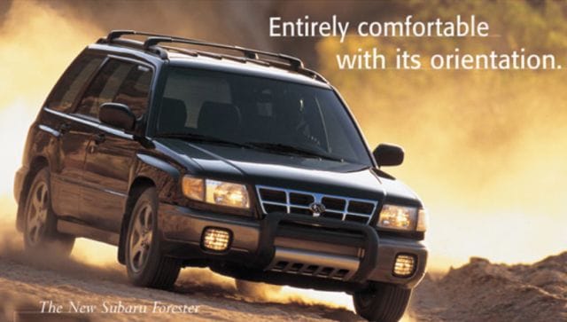 a car driving on a dirt road