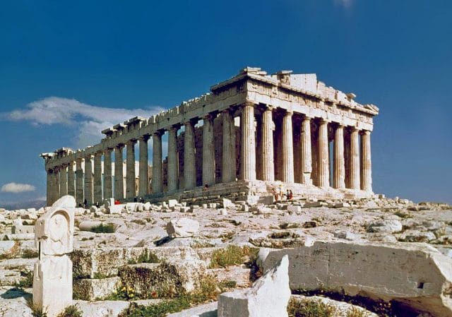 Parthenon with columns and a blue sky