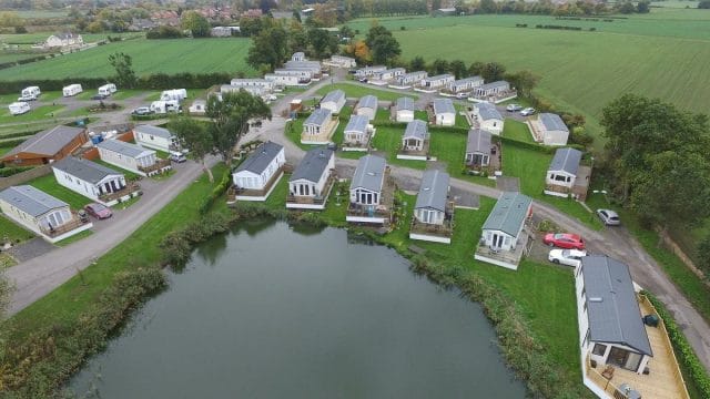 a group of houses next to a river