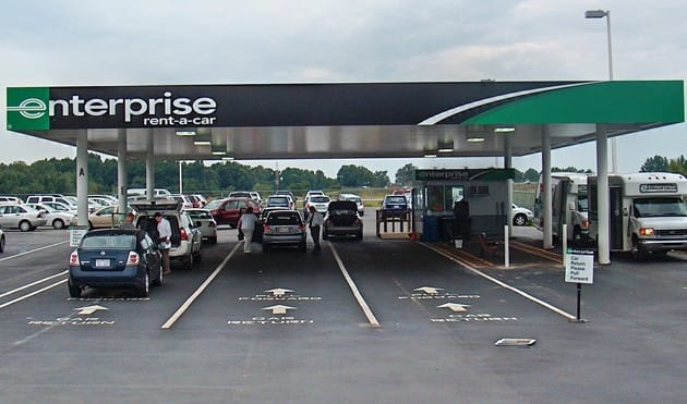 a group of cars parked at a gas station