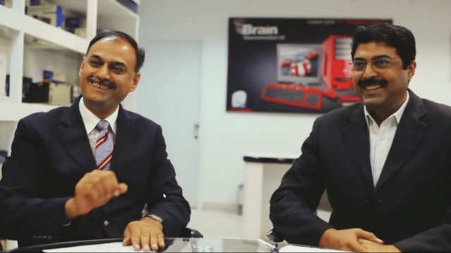 Amjad Farooq` Alvi et al. smiling