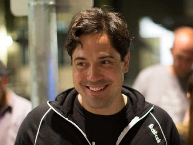 a person smiling at the camera