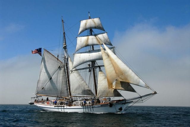 a large sailboat on the water