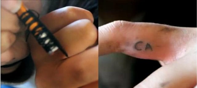 a person holding a marker