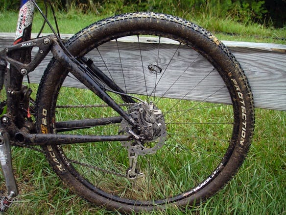 a bicycle wheel with a chain