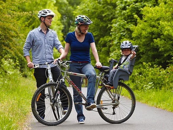 a man and woman on bicycles