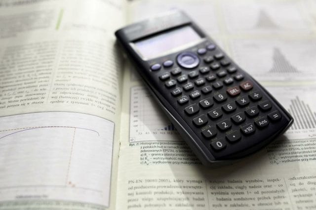 a calculator on a book