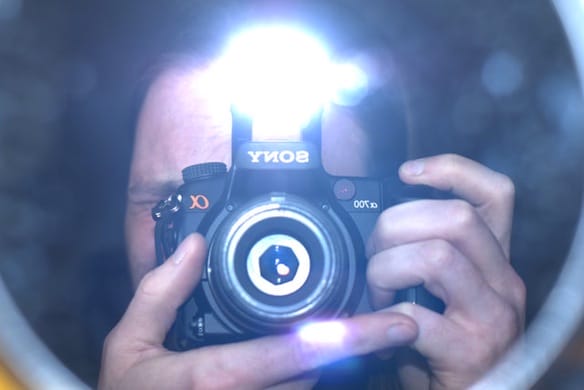 a person holding a camera