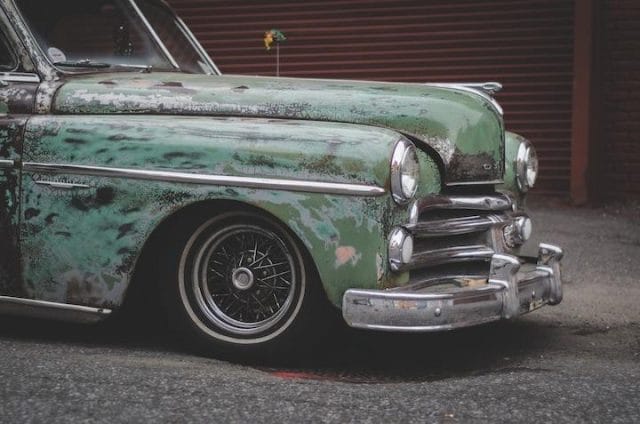 a car parked in front of a building