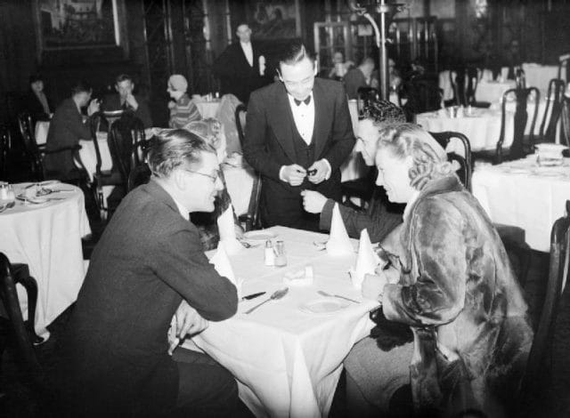 a group of people sitting at a table