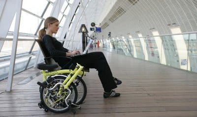 a person sitting on a bike