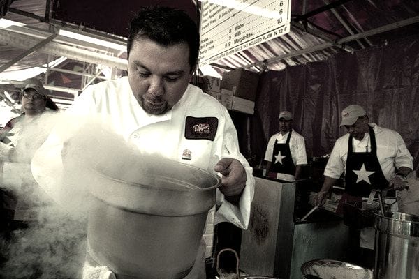 a man cooking in a restaurant