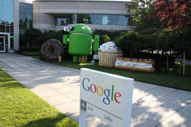 a sign in front of a building