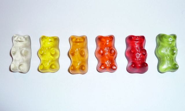 a group of different colored gummy bears