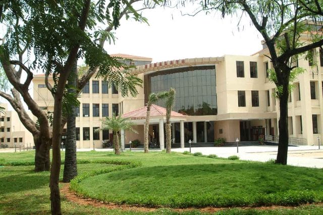 a building with trees in front of it