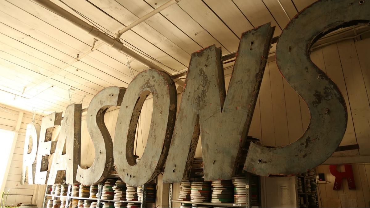 a large stack of barrels