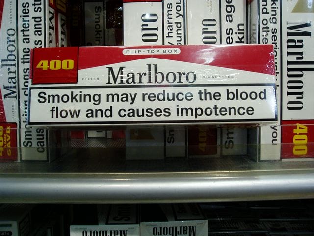 a shelf with signs on it