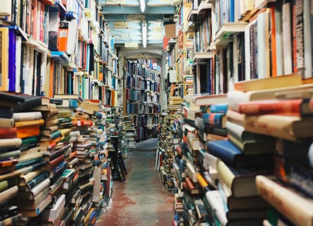 a large room with shelves of books