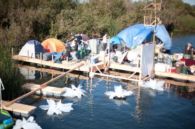 a group of people on a dock